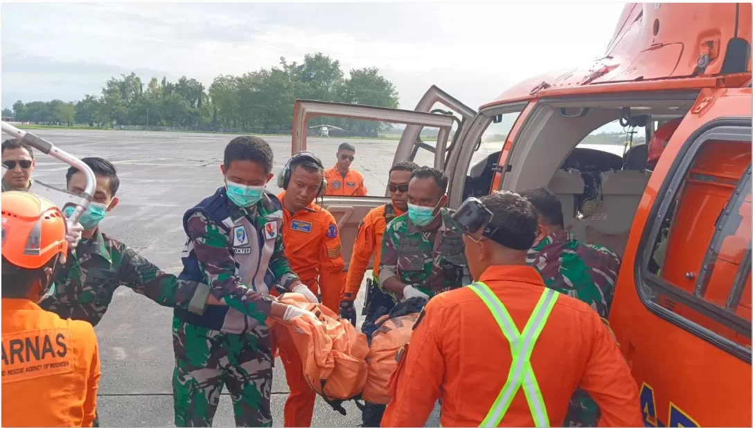 Tim Identifikasi Korban Pesawat Tim Identifikasi Korban Pesawat