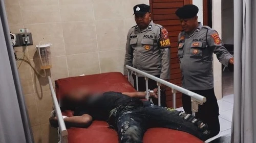 Buruh minum oli bekas